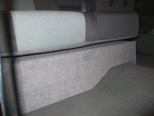 Custom subwoofer enclosure -  look at the conture of the box to the floor